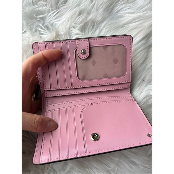 kate spade Handbags - Kate Spade Adel Medium Bifold Wallet in pink and tan on the outside